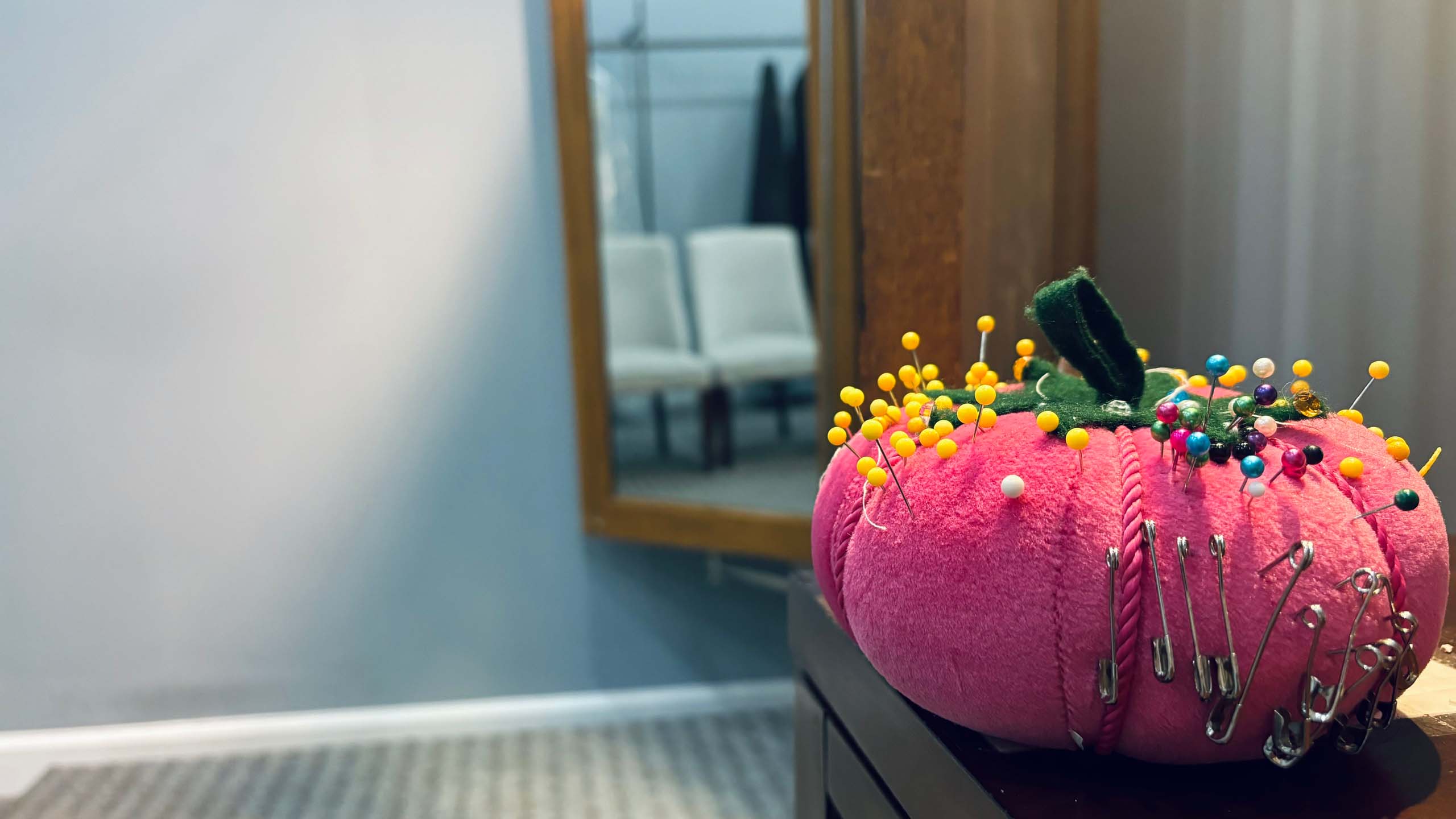 Up close shot of pin cushion in bridal suite.